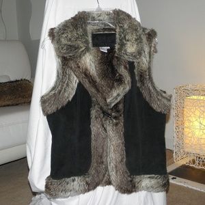 Really nice 100% leather(suede) and Faux fur